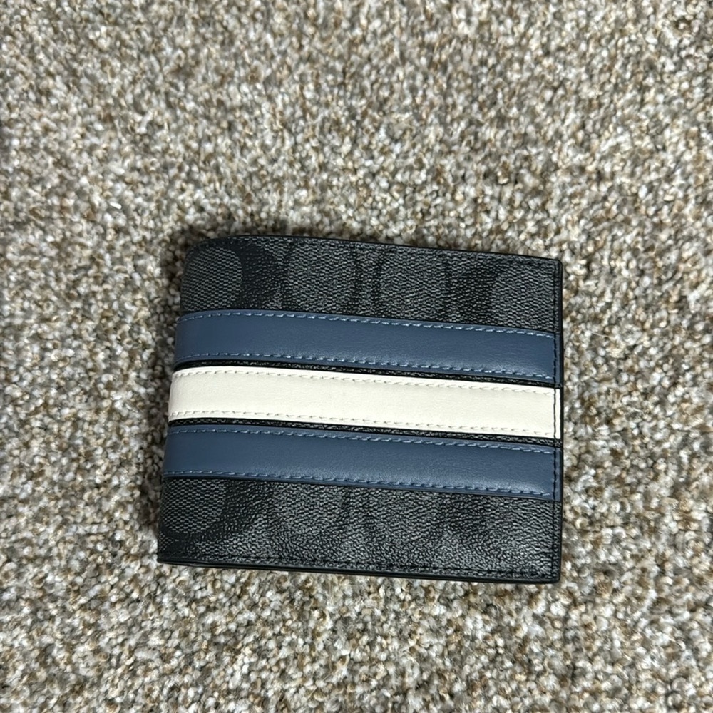 Men’s Coach wallet.
